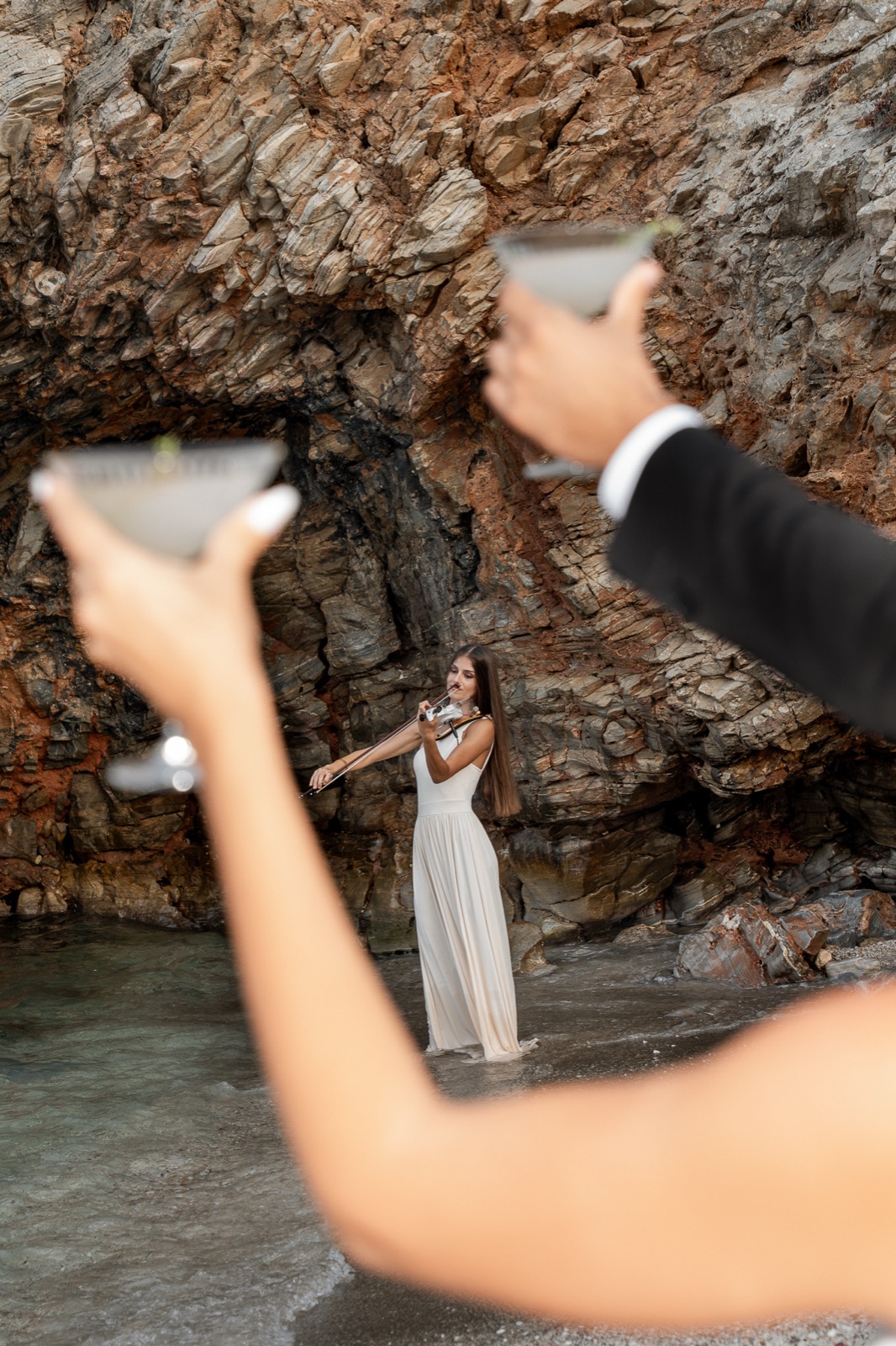 Live violin at an intimate private celebration by the sea